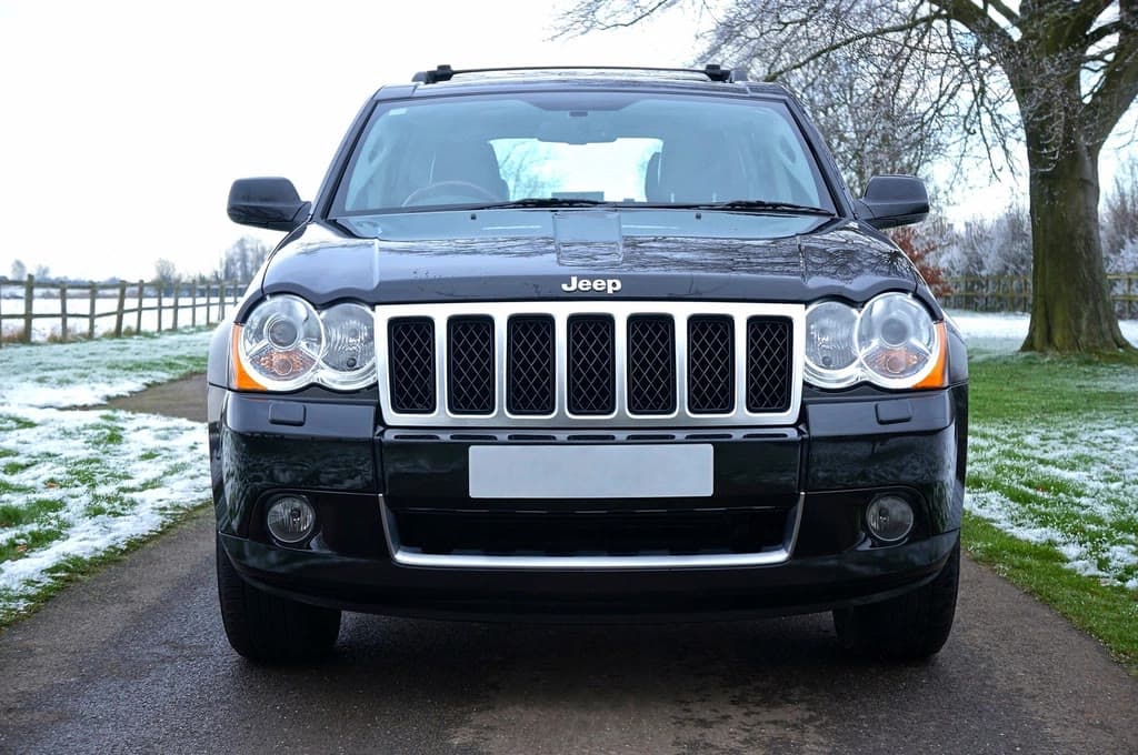 Front view of a dark SUV showing its windscreen